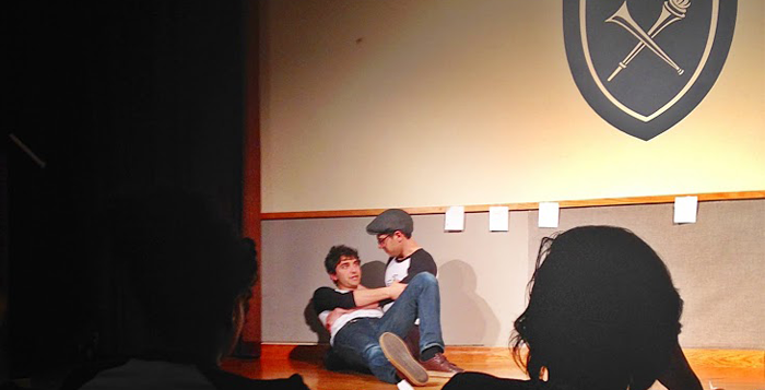 Loli Lucaciu/Asst. Student Life Editor College junior Josh Jacobs (left) and college super senior Jake Krakovsky (right) act out the beginning scene of Rathskellar's April Fools' Day show last Sunday in Harland Cinema.