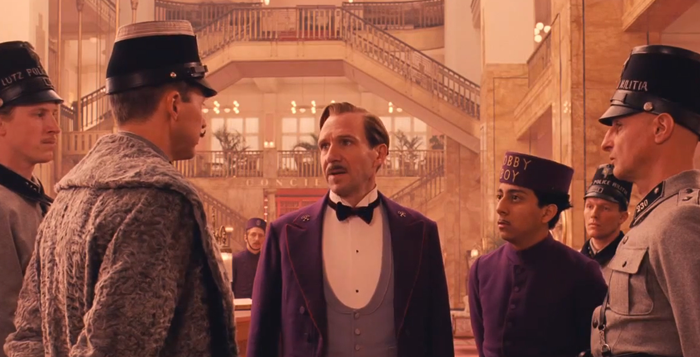 Courtesy of Scott Rudin Productions Ralph Fiennes (center) stars in writer/director Wes Anderson's latest effort "The Grand Budapest Hotel." The film also features Tilda Swinton, Bill Murray, Jude Law, Adrien Brody and many more.