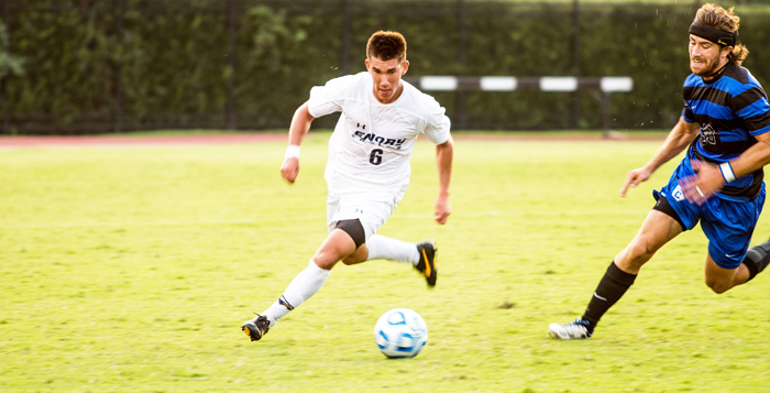 Junior midfielder Nick Schook runs the ball around a defender. Schook and the Eagles will take on the Panthers at Birmingham-Southern College (Ala.) Wednesday and try to extend their win-streak to eight games. Their record on the season is 7-0-1. | Courtesy of Emory Athletics