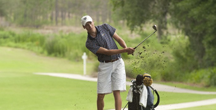 Senior Alex Wunderlich watches his shot as it leaves his club. Wunderlich and the Eagles finished sixth overall out of nine teams at the Al Jones Memorial tournament in Tyler, Texas last Tuesday and Wednesday. | Courtesy of Emory Athletics