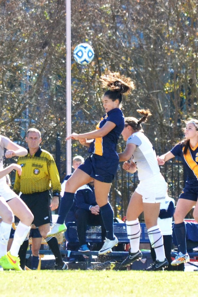 An Emory player heads the ball. The Eagles begin NCAA Division  III Championship play on Saturday in Crestview Hills, Ky. | Photo by Erin Baker, Staff Photographer